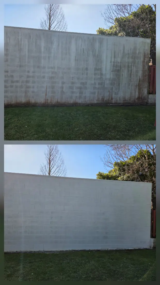 Rendered boundary wall, rust streaks removed